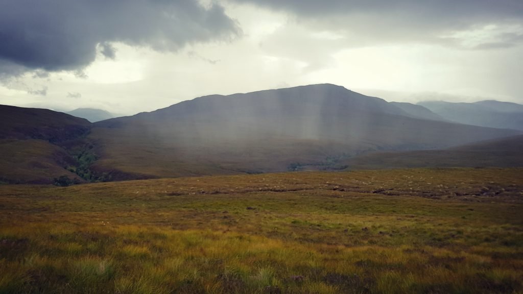 Photo of some rain crossing a glen