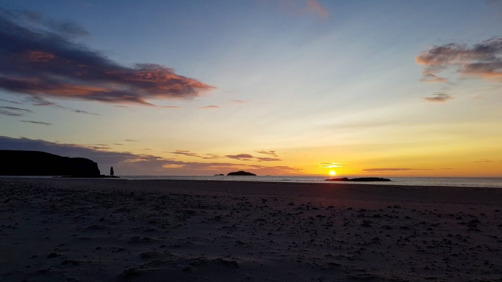 Sunset over Sandwood Bay.